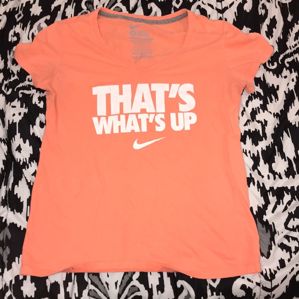 peach nike shirt